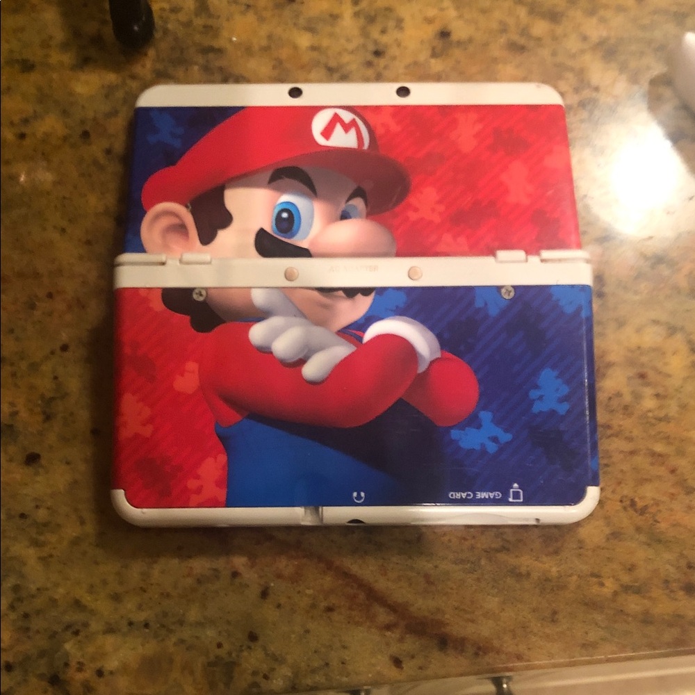 Nintendo Console with Red and Blue Mario Design